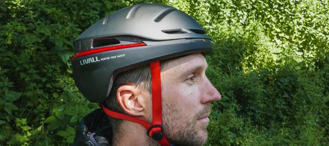Profile view of man wearing Livall EVO21 Smart Helmet