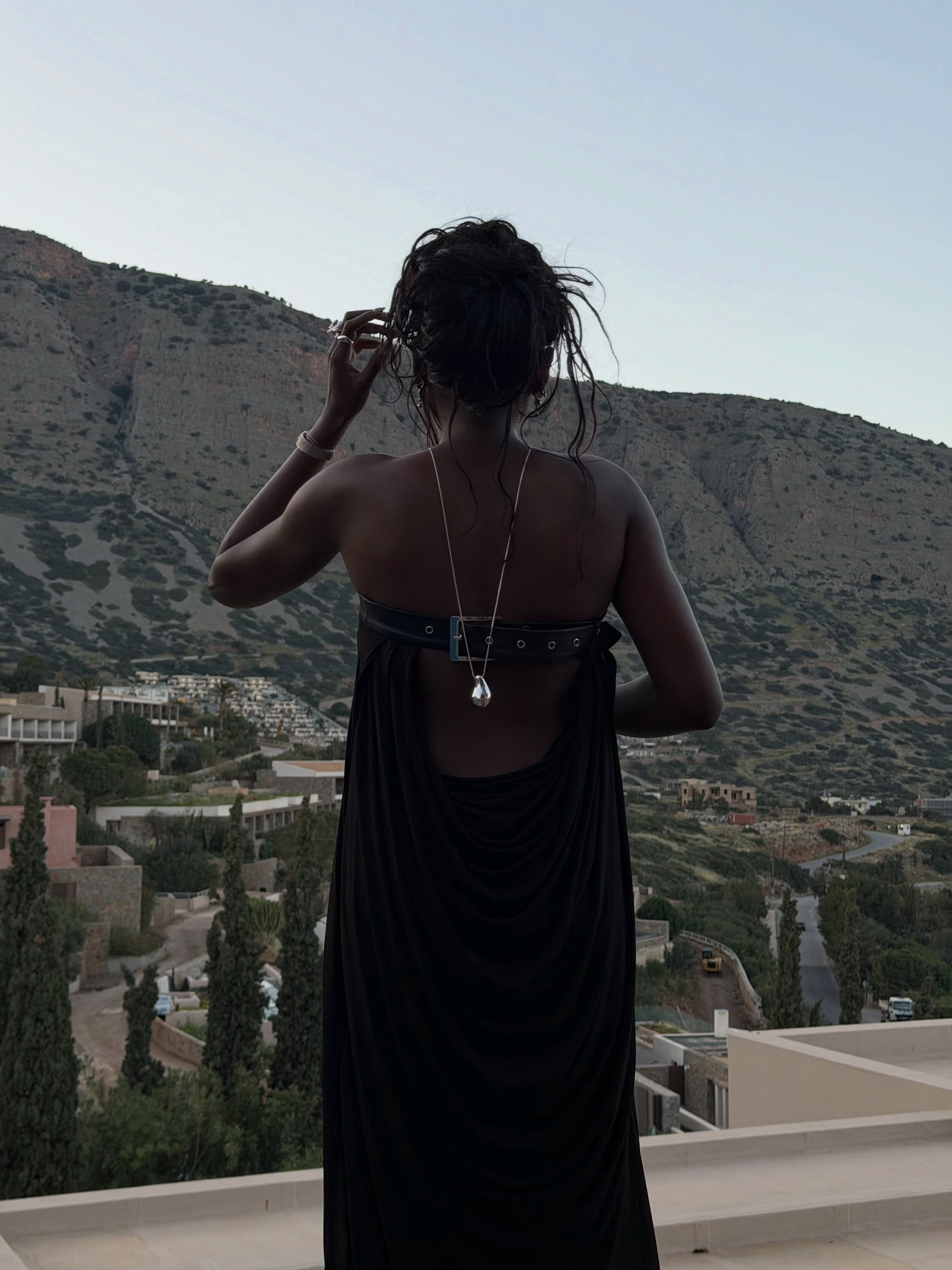 An image of a woman wearing best backless dress summer 2026
