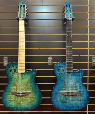 A photo showing two Godin Opal Ocean acoustic guitars