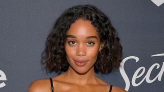 laura harrier with a naturally curly bob hairstyle