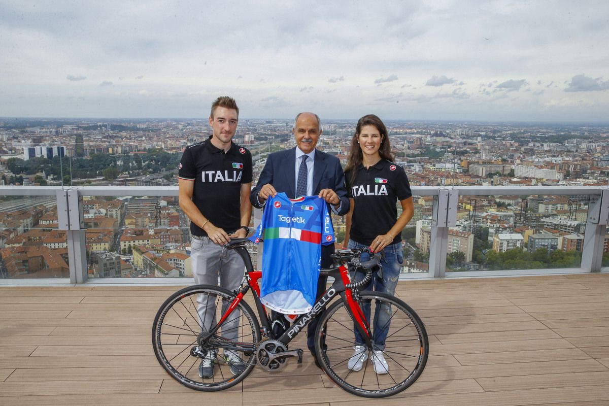 President of Italian Cycling, Renato di Rocco, with Elia Viviani and Elena Cecchini in Milan to reveal the national team jersey for the 2015 Worlds
