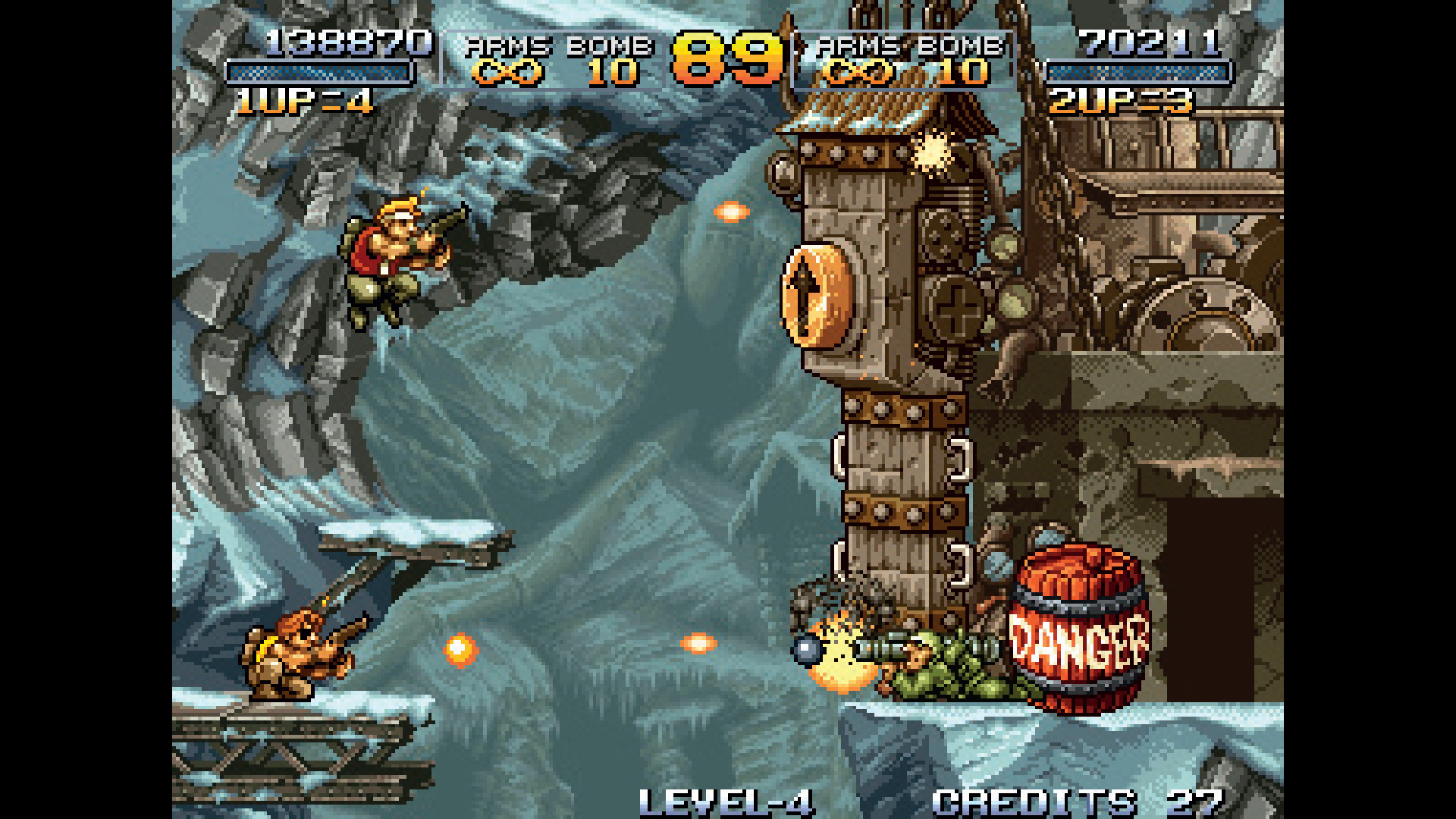 An enemy fires at players in an ice level in Metal Slug, from Retro Gamer #98, nearby a DANGER explosive barrel