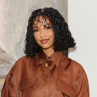 A guest wearing a fringed bob, a Paris Fashion Week SS25 Beauty Street Style look