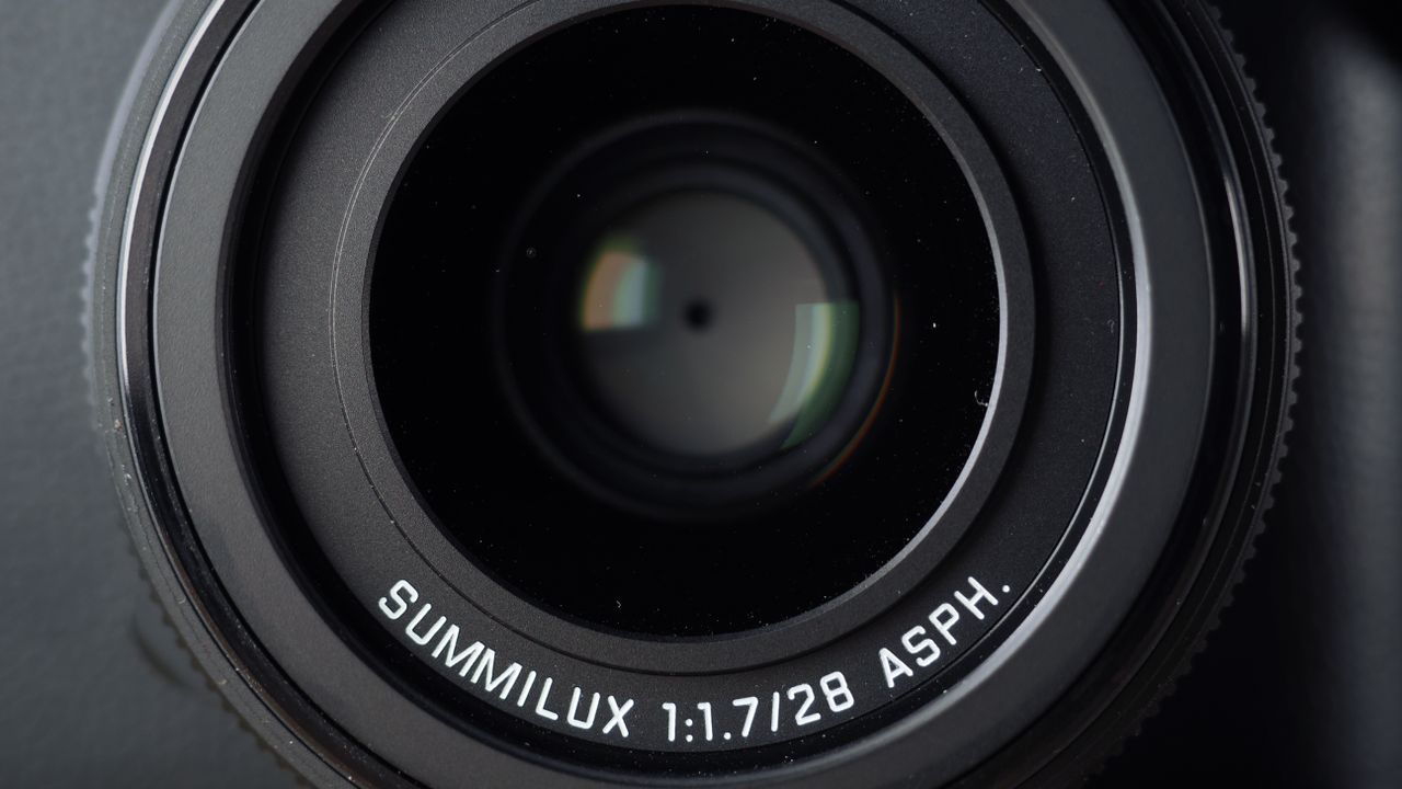 Leica Q3 Monochrom on a wooden surface