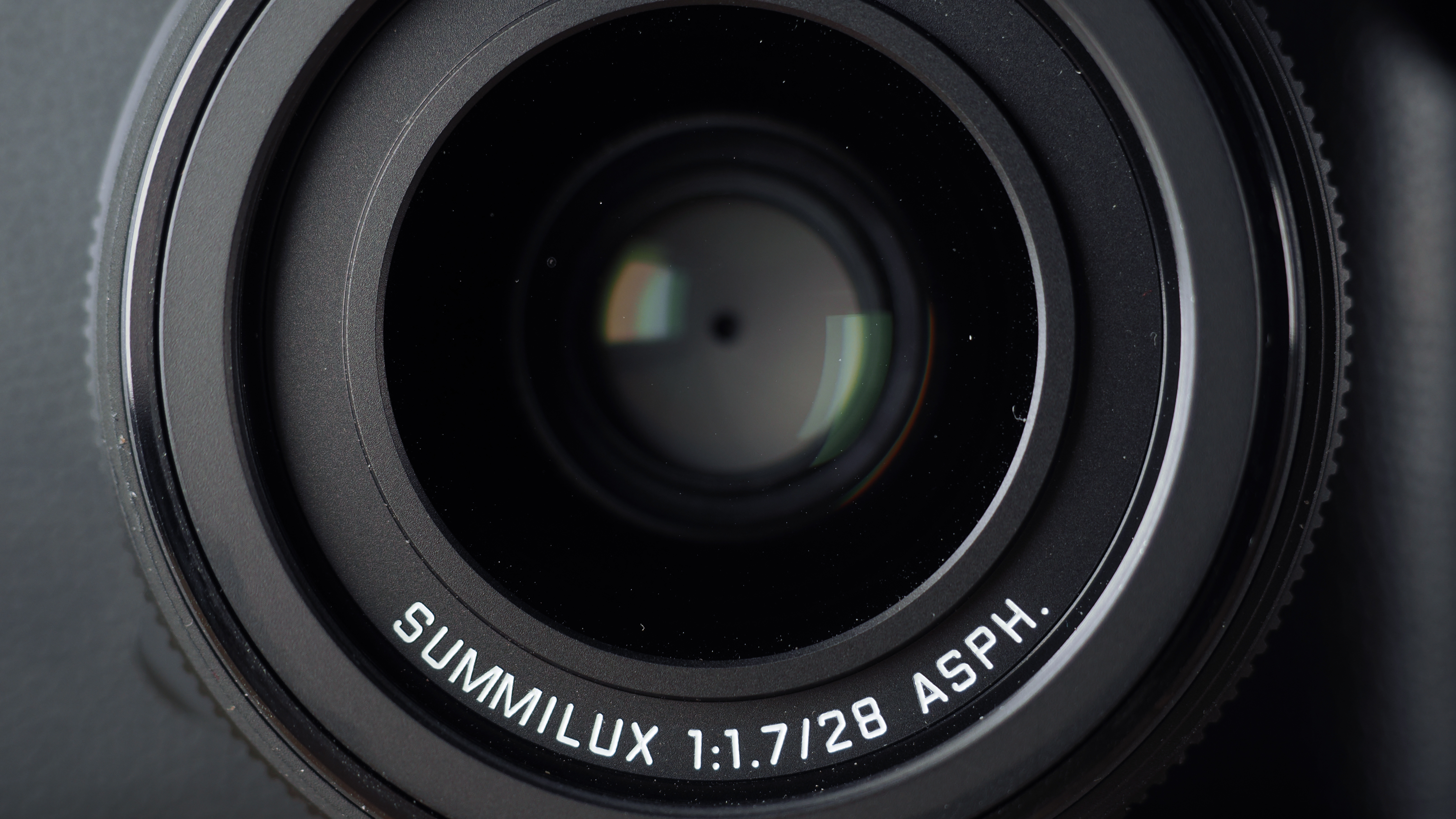 Leica Q3 Monochrom on a wooden surface