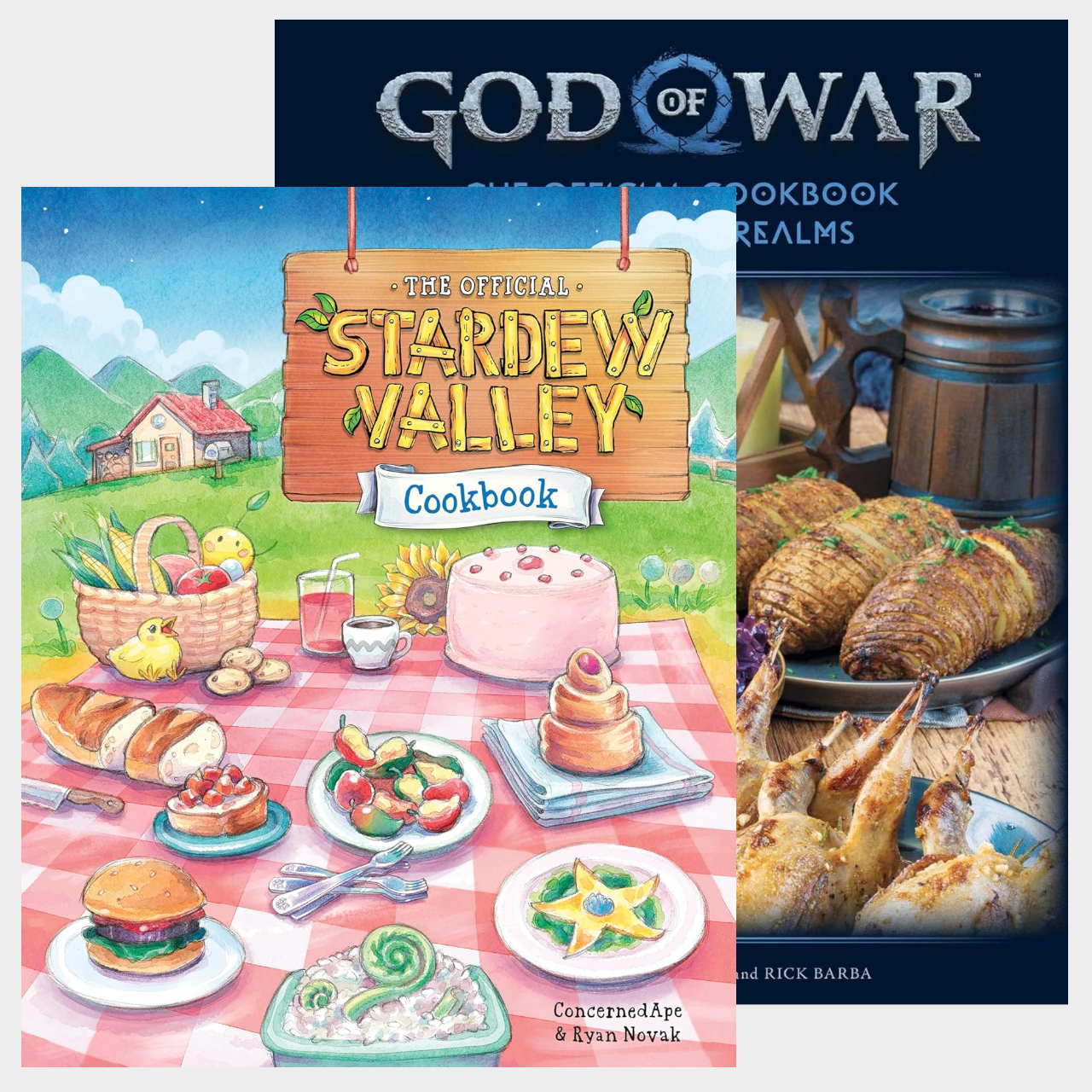 Stardew Valley and God of War cookbooks on a plain background