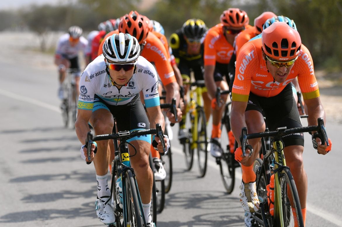 Alexey Lutsenko and Greg Van Avermaet ride side by side