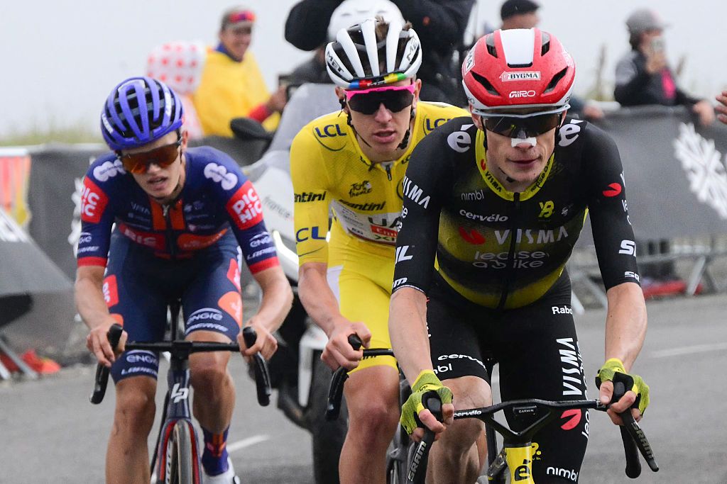 Team Picnic PostNL team's British rider Oscar Onley, UAE Team Emirates - XRG team's Slovenian rider Tadej Pogacar wearing the overall leader's yellow jersey and Team Visma - Lease a bike team's Danish rider Jonas Vingegaard cycle in the ascent of Col de la Loze during the 18th stage of the 112th edition of the Tour de France cycling race, 171.5 km between Vif and Courchevel Col de la Loze, in the Alps, southeastern France, on July 24, 2025. (Photo by Bernard PAPON / POOL / AFP) (Photo by BERNARD PAPON/POOL/AFP via Getty Images)