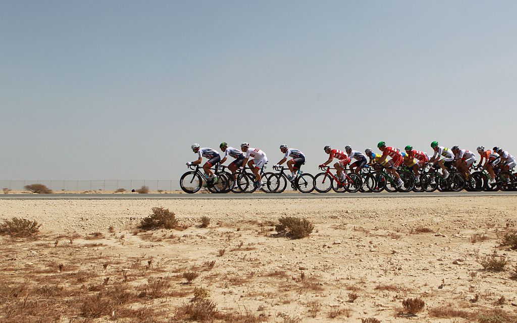 Cyclists compete in the mens elite road race event as part of the 2016 UCI Road World Championships on October 16 2016 in the Qatari capital Doha AFP KHALED DESOUKI Photo credit should read KHALED DESOUKIAFP via Getty Images