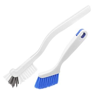 A set of two white scrubbing brushes with grey, white and blue bristles