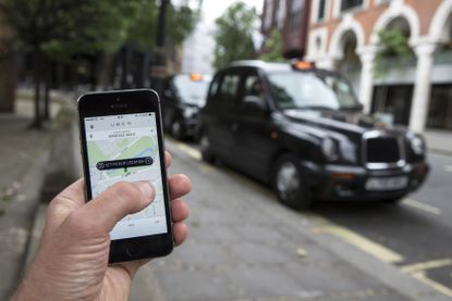 The Uber app on a phone in London