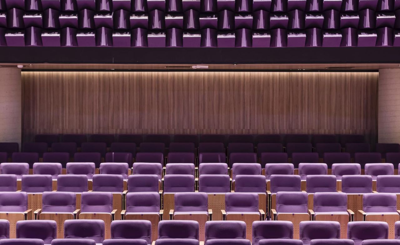 geometric purple seating in sao paulo teatro vivo, cinema architecture by Greg Bousquet 