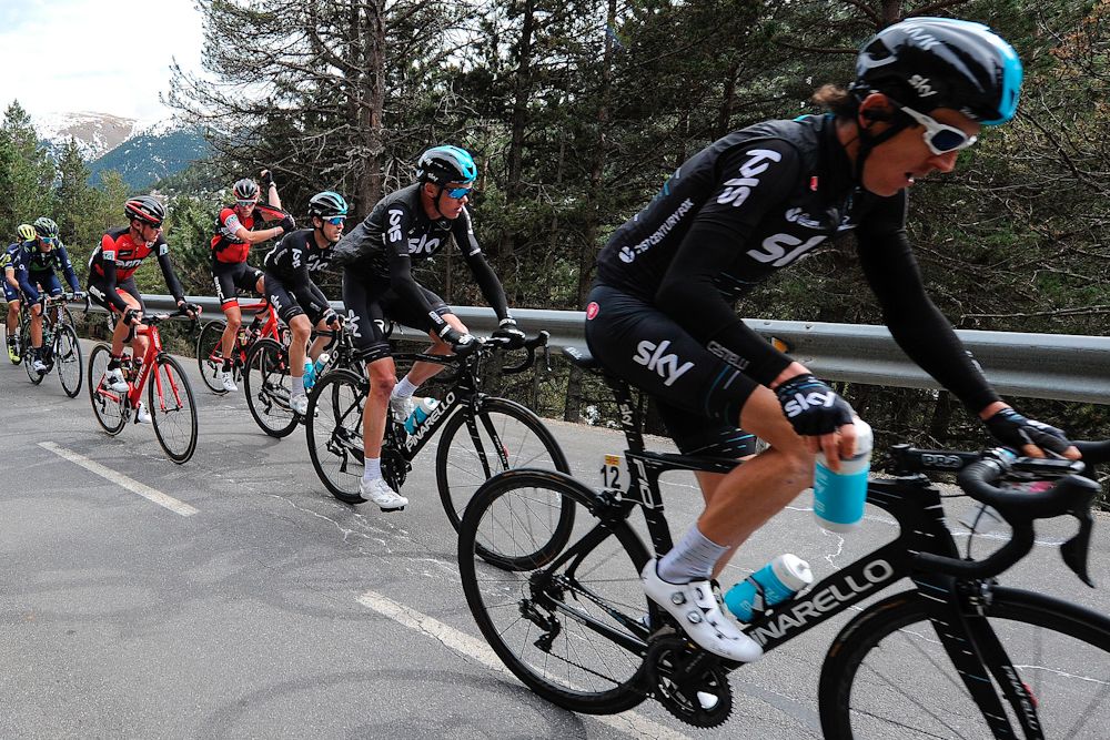 Geraint Thomas (R) and Sky's British rider Christopher Froome (2ndR) ride on the third day of the 97th Volta Catalunya