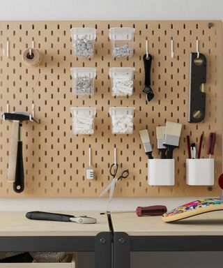 ikea pegboard storing tools and craft supplies