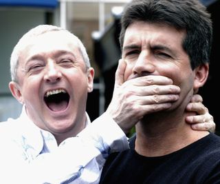 X Factor judges Simon Cowell and Louis Walsh in 2004