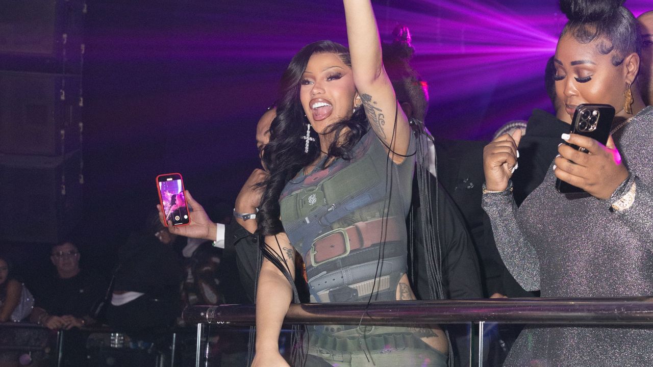 Cardi B in a belt-effect dress by Syndical Chamber