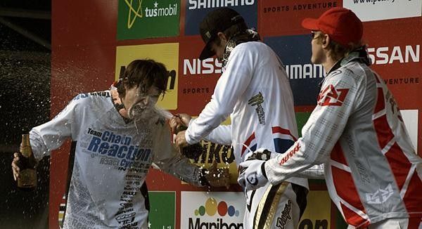 Steve Peat and Sam Hill congratulate Julien Cammelini,