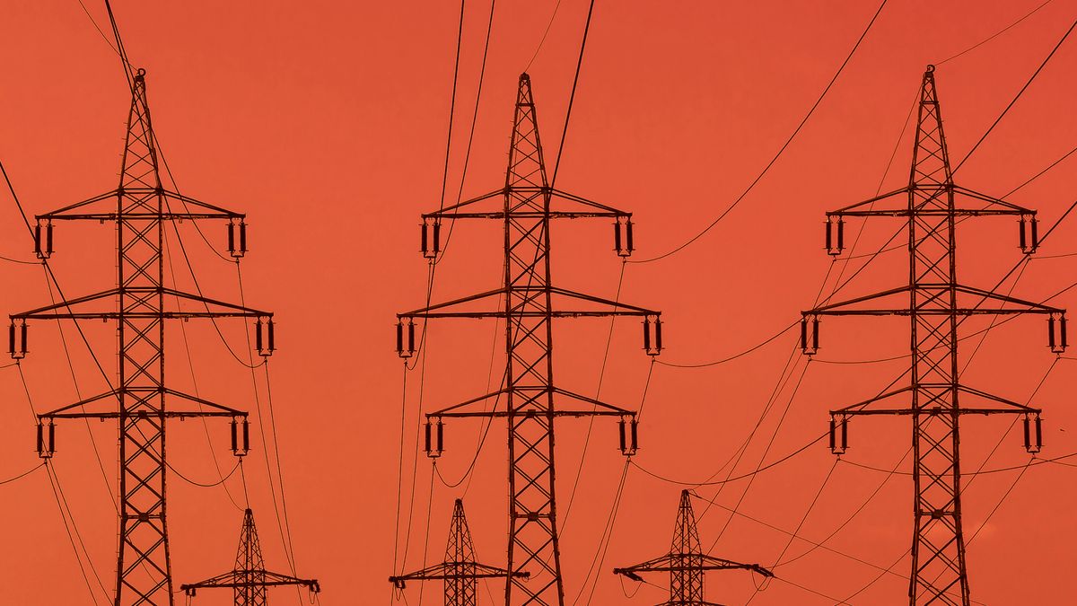 Energy pylons against a blood-red sky