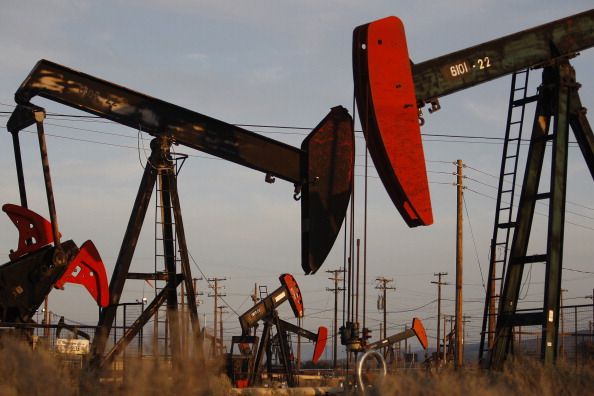 Pump jacks and wells in an oil field.