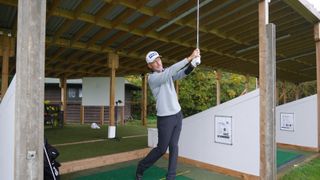 PGA pro Barney Puttick hitting a golf shot at Essendon GC