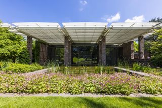 Fondation Beyeler exterior with greenery and pond