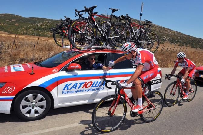 Yuri Trofimov (Katusha) collecting bidons