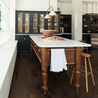 deVOL navy kitchen with wooden prep table