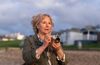 Penny Downie guests stars as photographer Izzy in episode 1 of Whitstable Pearl 3.