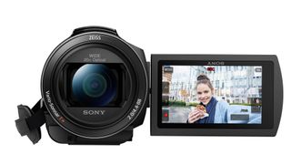 Best camera for video: Sony FDR-AX43 on a white background with LCD folded out for vlogging