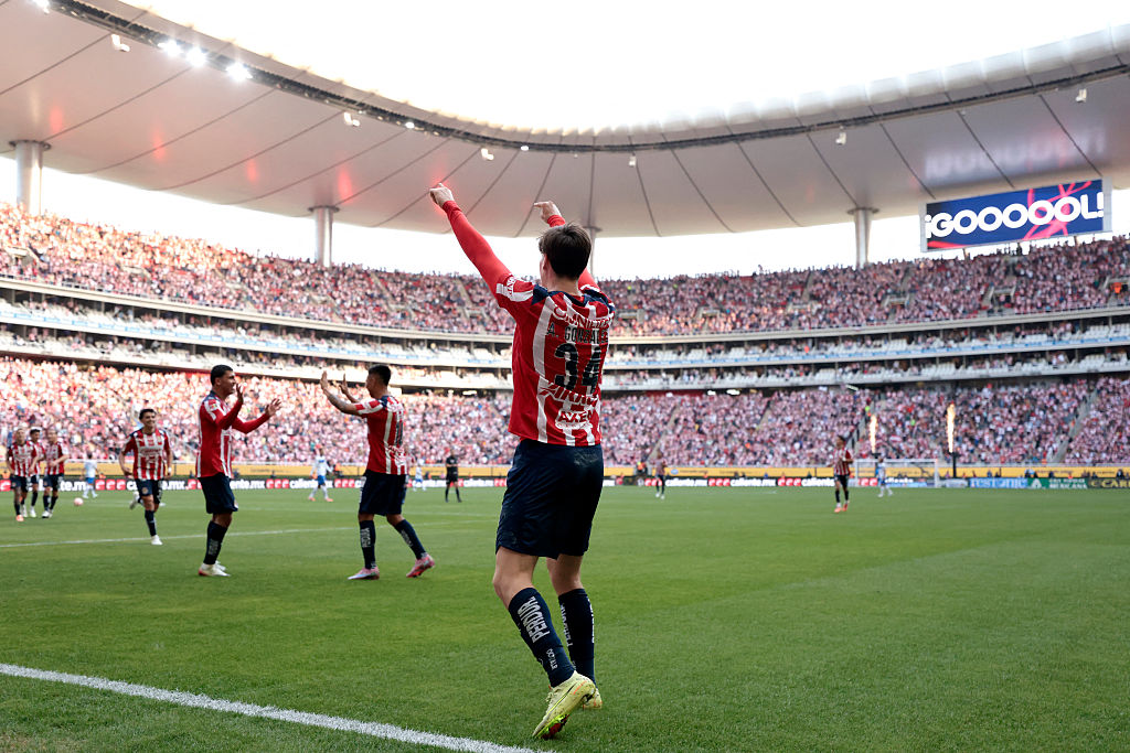 Guadalajara's forward #34 Armando Gonzalez celebrates after scoring during the Liga MX Apertura football match between Guadalajara and Monterrey at the Akron Stadium in Zapopan, Mexico on November 8, 2025. (Photo by Ulises Ruiz / AFP)