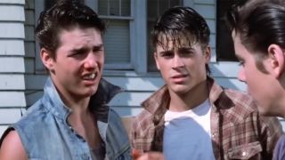 Tom Cruise as Steve Randall, next to Rob Lowe’s Sodapop Curtis in “The Outsiders.”