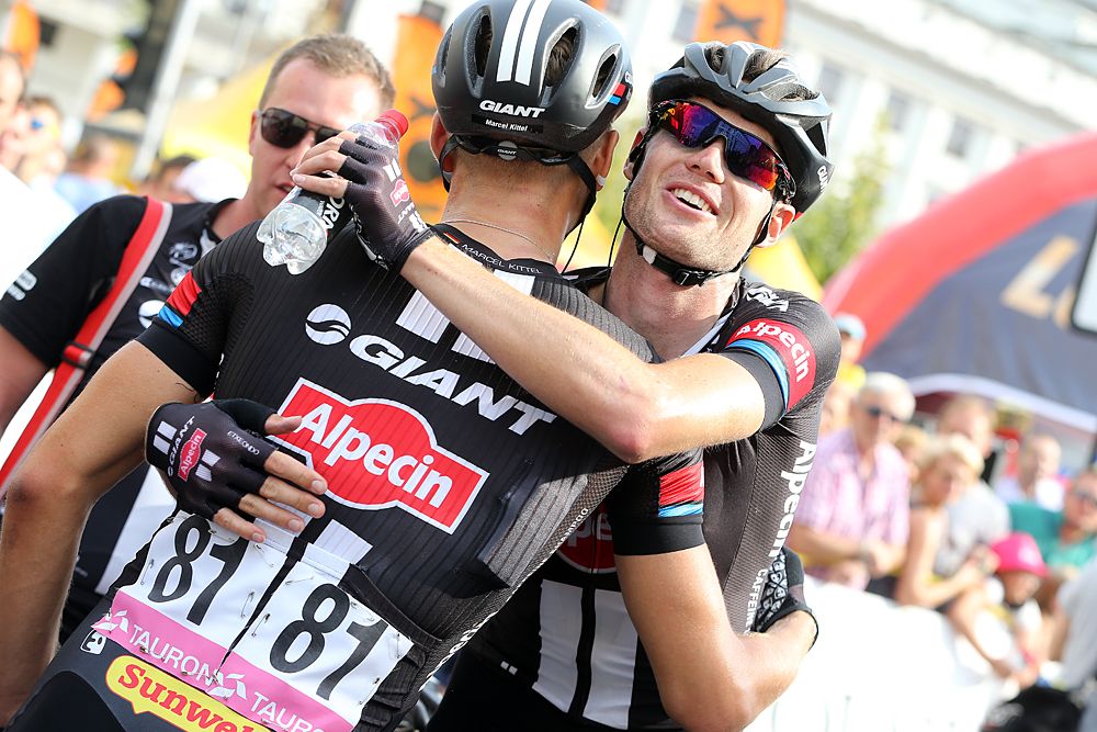 Marcel Kittel's Giant-Alpecin teammates congratulate him on the stage 1 win