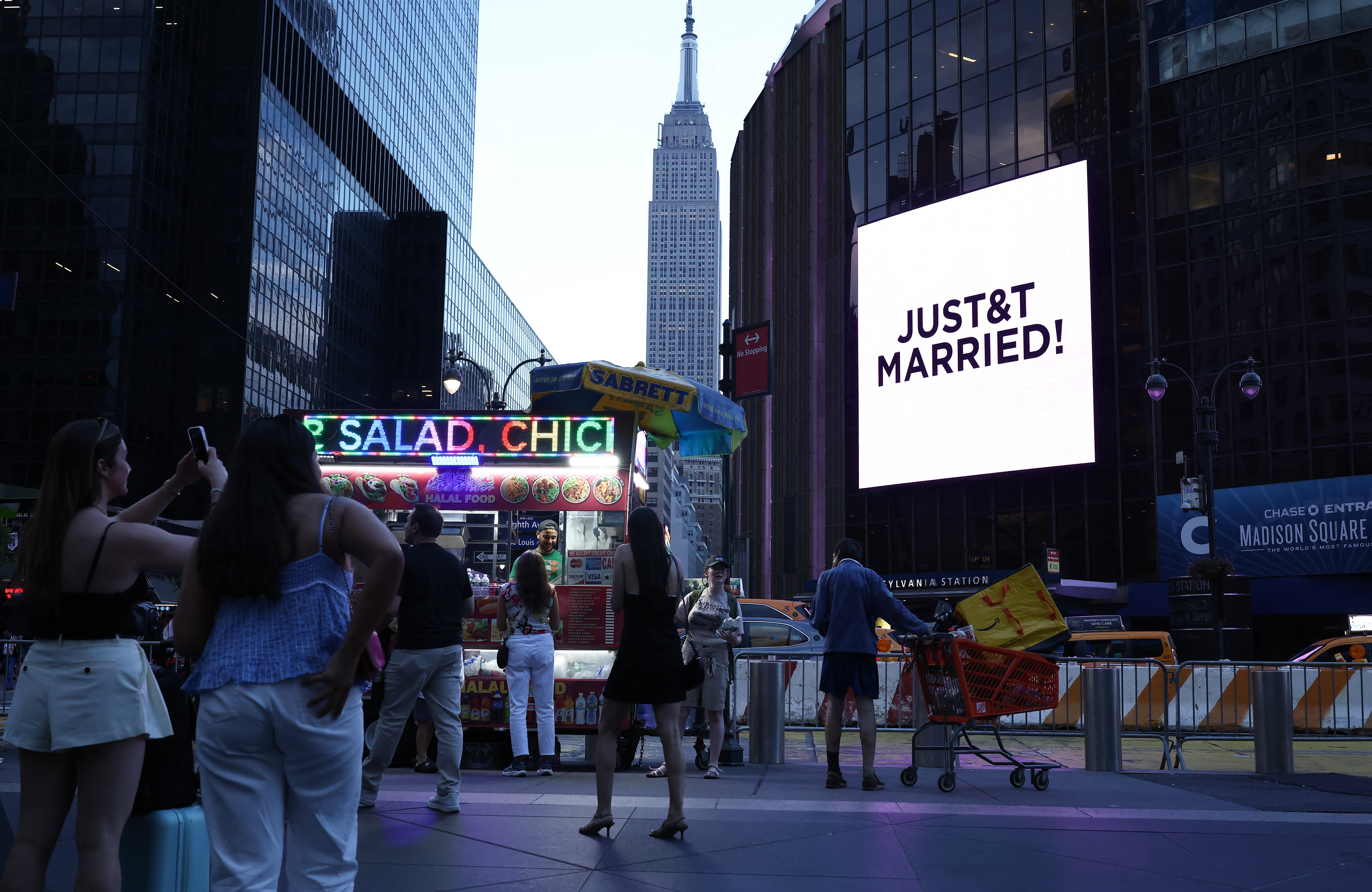 Taylor Swift and Travis Kelce are married at Madison Square Garden and a sign announces their nuptials outside