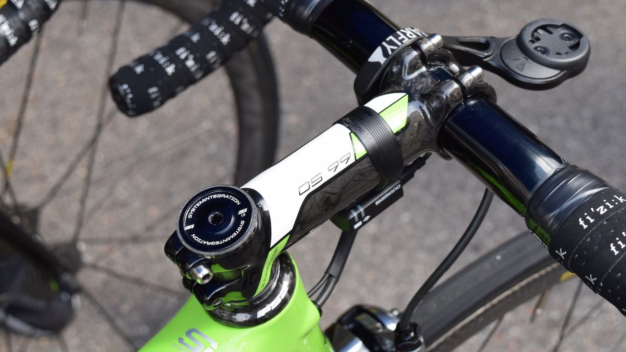 An FSA headset and stem at the front end of the bike
