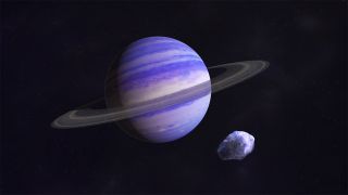 purplish ringed planet with small icy blob