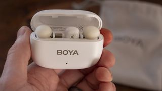 Boya Mini wireless mic charging case with mics and receiver inside