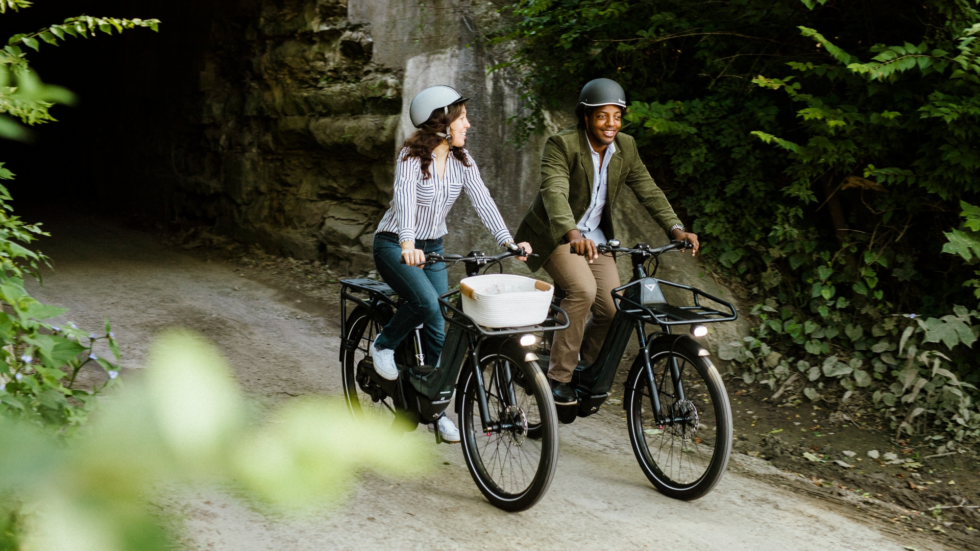 Couple riding two of Vaast's E/1 luxury urban eBike