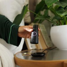 the Lumen metabolism device on a bedside table