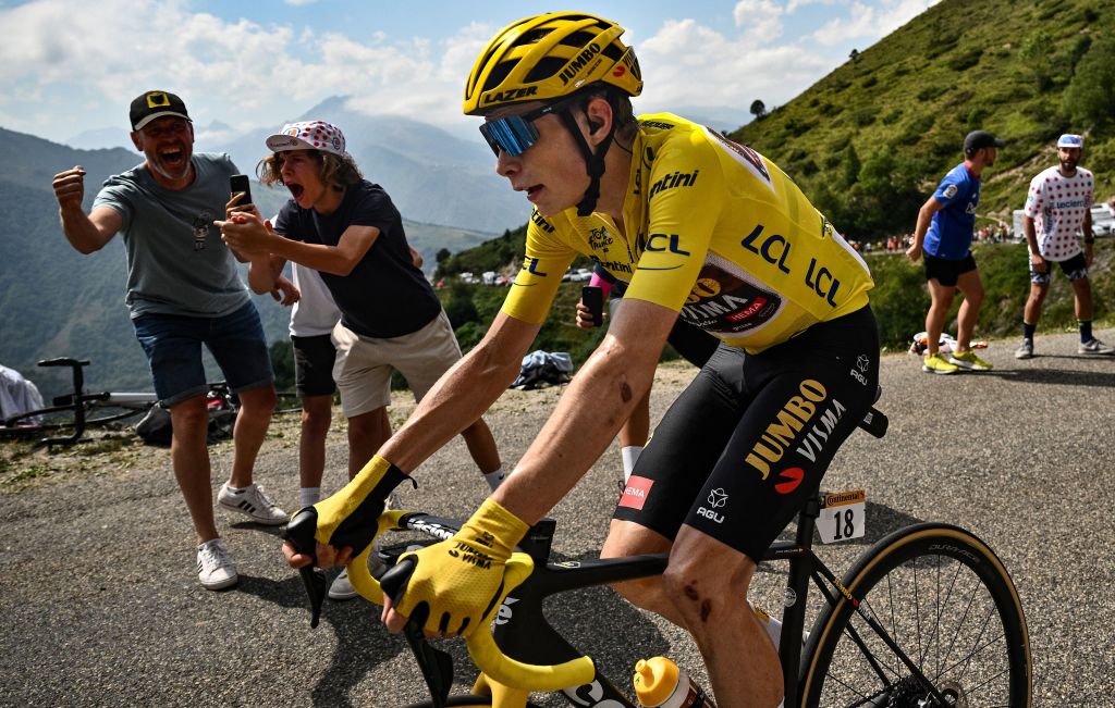 TOPSHOT JumboVisma teams Danish rider Jonas Vingegaard C wearing the overall leaders yellow jersey cycles in the ascent of Col de Val LouronAzet during the 17th stage of the 109th edition of the Tour de France cycling race 1297 km between SaintGaudens and Peyragudes in southwestern France on July 20 2022 Photo by Marco BERTORELLO AFP Photo by MARCO BERTORELLOAFP via Getty Images