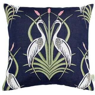 herons design on blue cushion