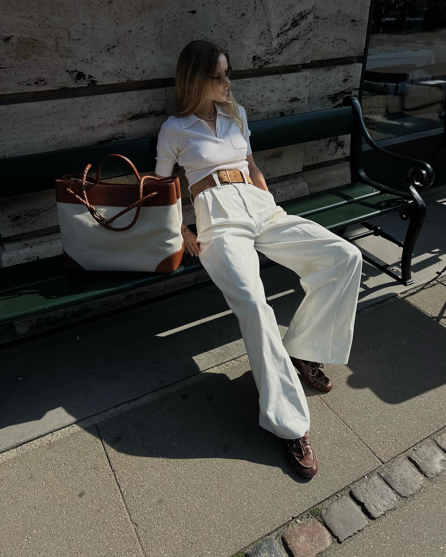 An image of @pernilleteisbaek wearing an all-white outfit for women.