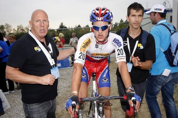 Zdenek Stybar receives congratulations from this teammanager Hans Van Kasteren, left.