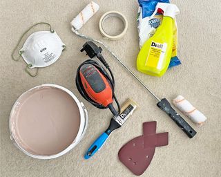 tools and materials to paint a door