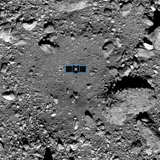 This image shows sample site Nightingale, OSIRIS-REx’s primary sample collection site on asteroid Bennu. The image is overlaid with a graphic of the OSIRIS-REx spacecraft to illustrate the scale of the site.