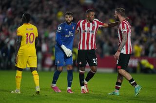 Brentford goalkeeper David Raya Martin (second left), Mathias Jorgensen (second right) and Pontus Jansson (right) celebrate at the final whistle during the Premier League match at Brentford Community Stadium, London. Picture date: Saturday September 25, 2021