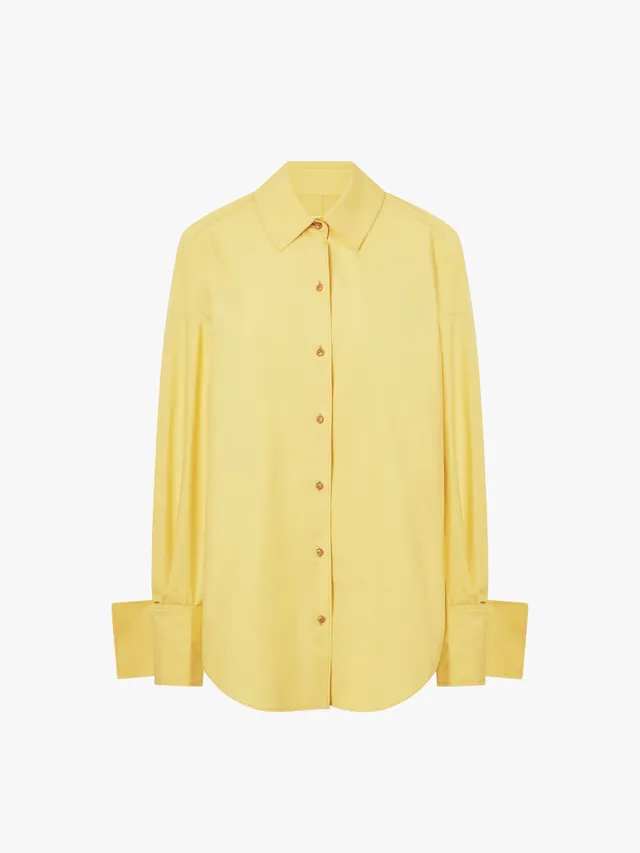 Yellow button-down shirt