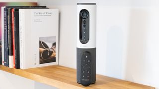 A Logitech ConferenceCam Connect on a bookshelf; one of the best Mac webcams