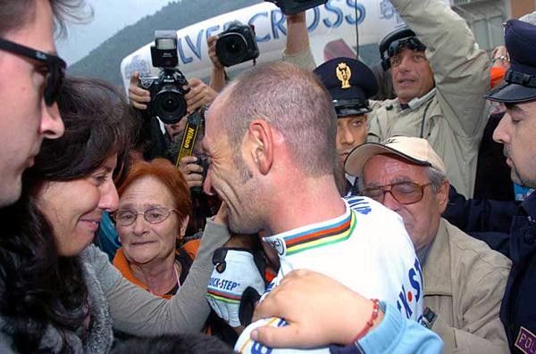Paolo Bettini (Quick-Step) with wife and parents in background