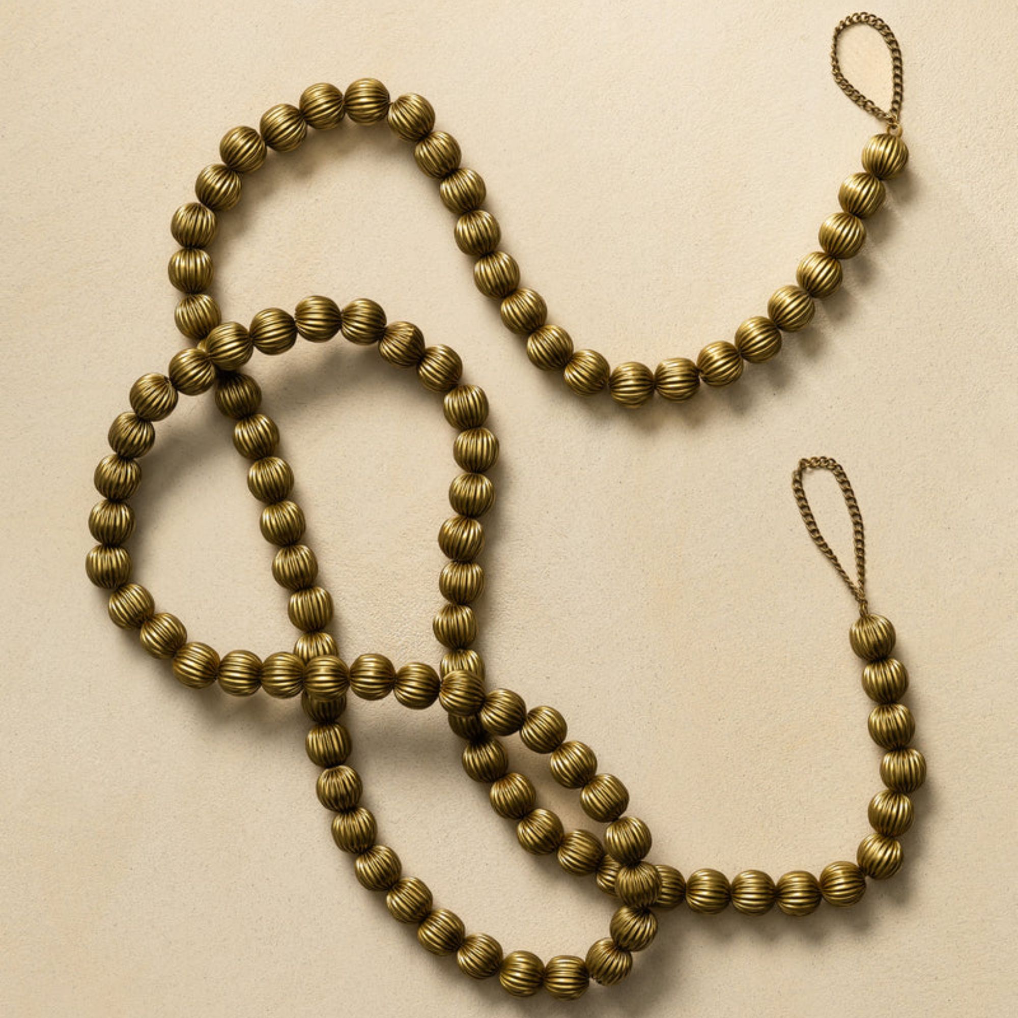 Beaded brass garland
