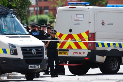 Police investigate the Manchester bombing